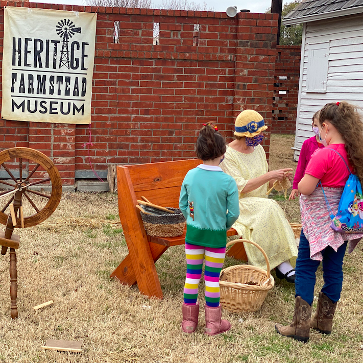 Woman teaching to children
