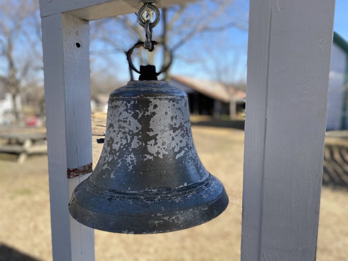 Photo of historic bell at the Heritage Farmstead Museum